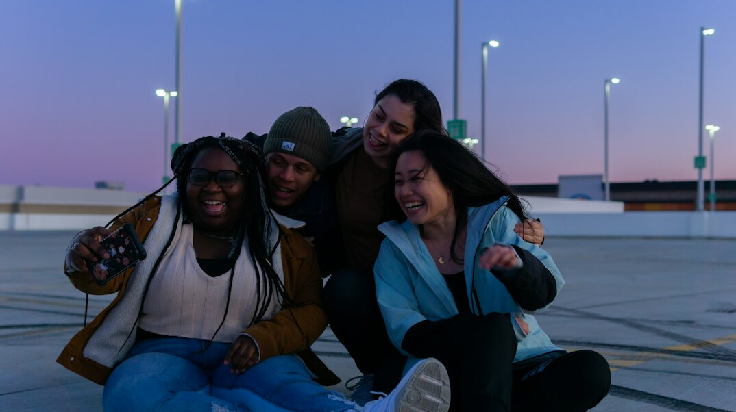 group of friends embracing