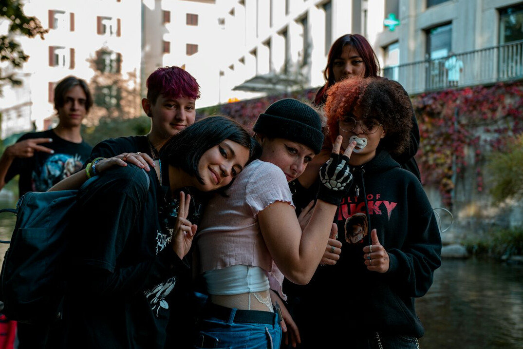 group of friends embracing